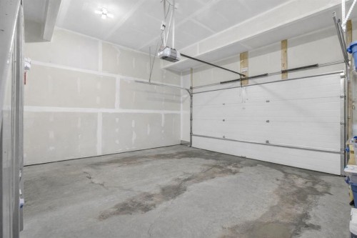 218 Riviera View, Cochrane, AB - Indoor Photo Showing Garage