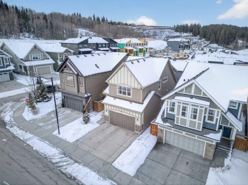 218 Riviera View, Cochrane, AB - Outdoor With Deck Patio Veranda With Facade