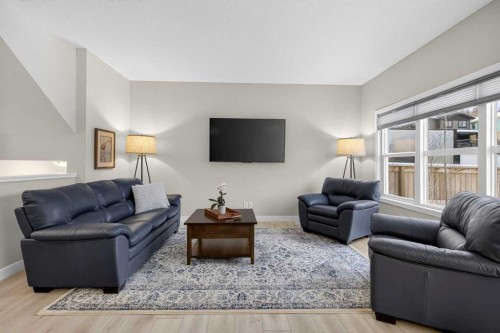 218 Riviera View, Cochrane, AB - Indoor Photo Showing Living Room