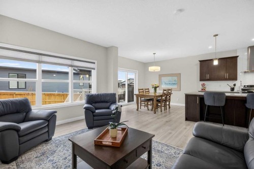 218 Riviera View, Cochrane, AB - Indoor Photo Showing Living Room
