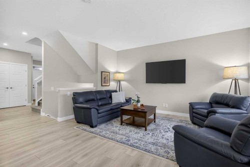218 Riviera View, Cochrane, AB - Indoor Photo Showing Living Room