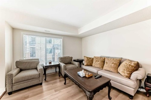 143-300 Marina Drive, Chestermere, AB - Indoor Photo Showing Living Room