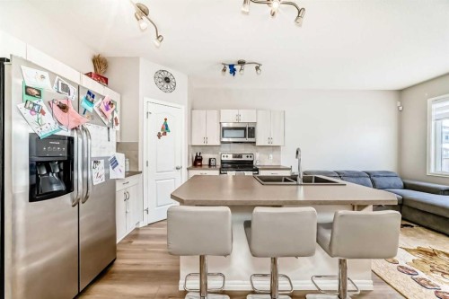 234 Legacy Mews Se, Calgary, AB - Indoor Photo Showing Kitchen With Stainless Steel Kitchen With Double Sink