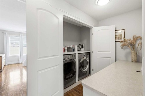 230 Quarry Park Boulevard Se, Calgary, AB - Indoor Photo Showing Laundry Room