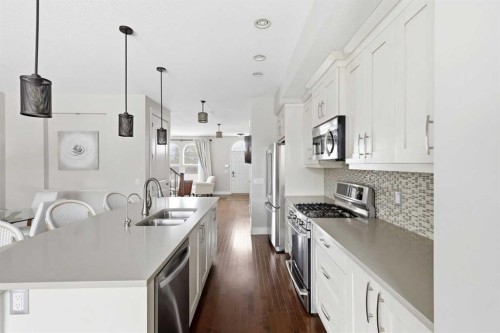 230 Quarry Park Boulevard Se, Calgary, AB - Indoor Photo Showing Kitchen With Double Sink With Upgraded Kitchen