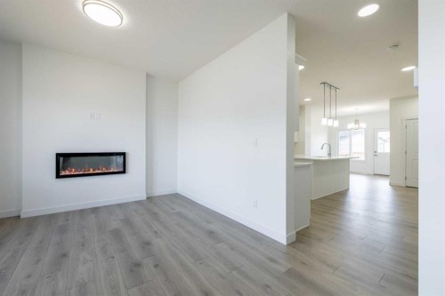 260 Clearview Court, Chestermere, AB - Indoor Photo Showing Living Room With Fireplace