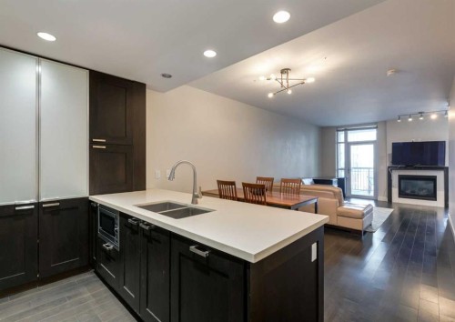 414-222 Riverfront Avenue Sw, Calgary, AB - Indoor With Fireplace