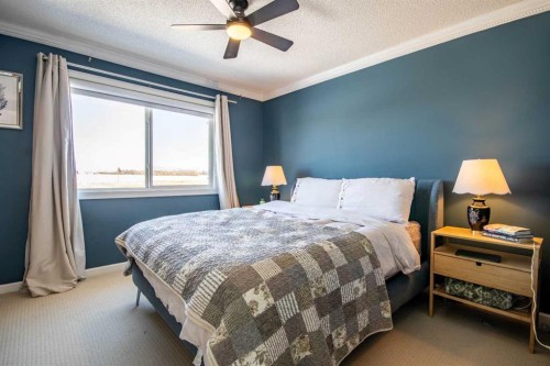 203 Clover Way, Carstairs, AB - Indoor Photo Showing Bedroom