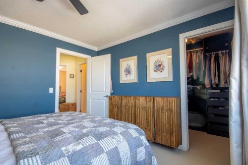 203 Clover Way, Carstairs, AB - Indoor Photo Showing Bedroom
