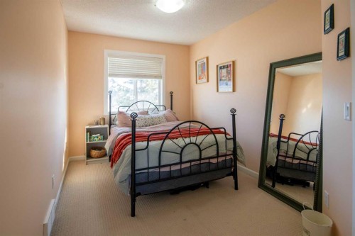 203 Clover Way, Carstairs, AB - Indoor Photo Showing Bedroom
