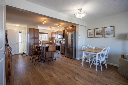 203 Clover Way, Carstairs, AB - Indoor Photo Showing Dining Room