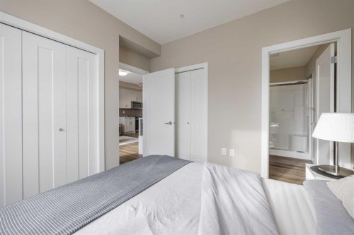 210-25 Walgrove Walk Se, Calgary, AB - Indoor Photo Showing Bedroom