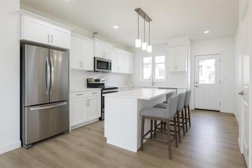 264 Clearview Court, Chestermere, AB - Indoor Photo Showing Kitchen With Upgraded Kitchen