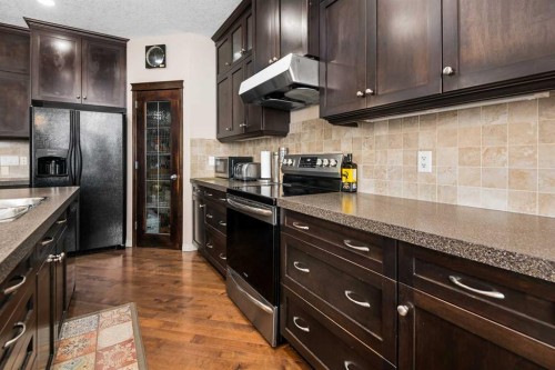 79 Pantego Way Nw, Calgary, AB - Indoor Photo Showing Kitchen With Double Sink
