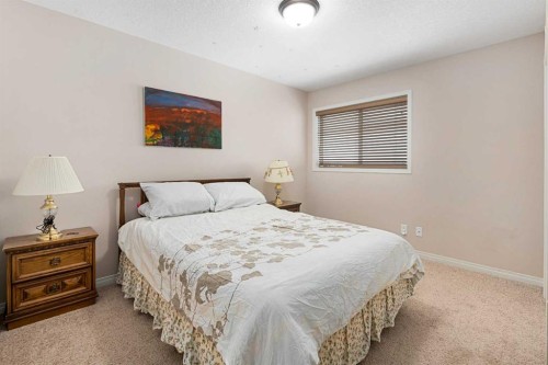 79 Pantego Way Nw, Calgary, AB - Indoor Photo Showing Bedroom