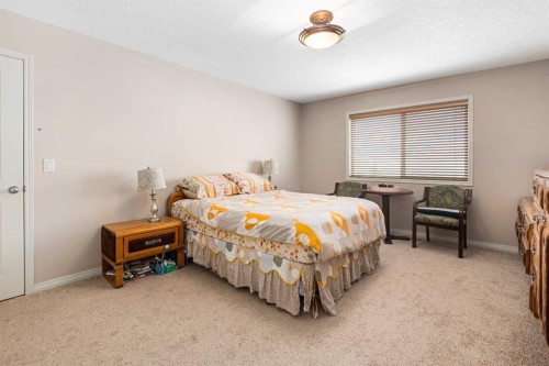 79 Pantego Way Nw, Calgary, AB - Indoor Photo Showing Bedroom
