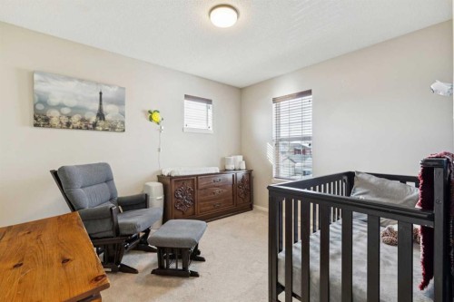 344 Silverado Drive Sw, Calgary, AB - Indoor Photo Showing Bedroom