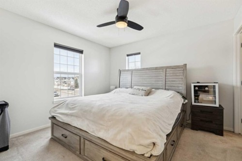 344 Silverado Drive Sw, Calgary, AB - Indoor Photo Showing Bedroom