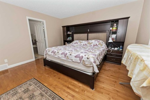 50 Panamount View Nw, Calgary, AB - Indoor Photo Showing Bedroom