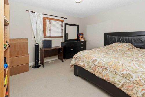50 Panamount View Nw, Calgary, AB - Indoor Photo Showing Bedroom