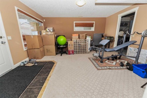 50 Panamount View Nw, Calgary, AB - Indoor Photo Showing Gym Room