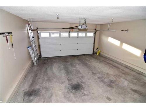 50 Panamount View Nw, Calgary, AB - Indoor Photo Showing Garage