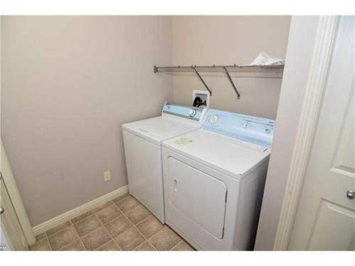 50 Panamount View Nw, Calgary, AB - Indoor Photo Showing Laundry Room