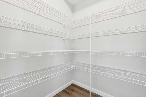 101-40 Creekside Way Sw, Calgary, AB - Indoor With Storage