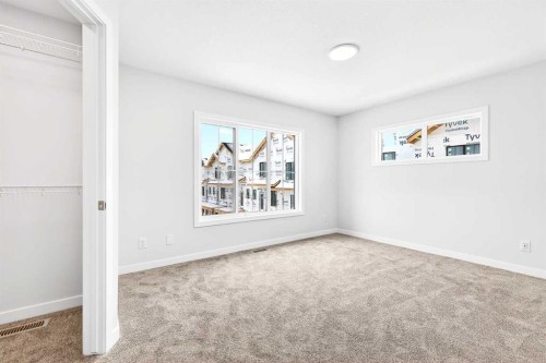 101-40 Creekside Way Sw, Calgary, AB - Indoor Photo Showing Other Room