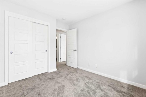 101-40 Creekside Way Sw, Calgary, AB - Indoor Photo Showing Other Room