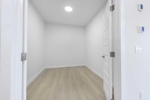 122 Sandpiper Bend, Chestermere, AB - Indoor Photo Showing Other Room