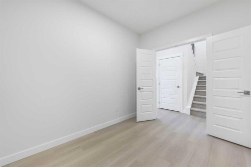122 Sandpiper Bend, Chestermere, AB - Indoor Photo Showing Other Room
