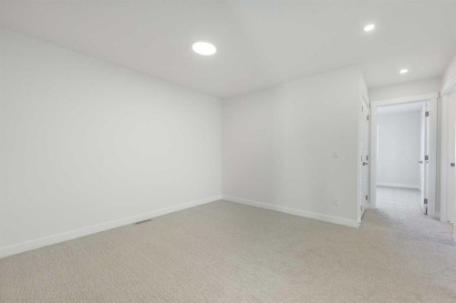 122 Sandpiper Bend, Chestermere, AB - Indoor Photo Showing Other Room