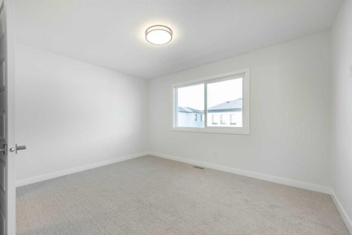 122 Sandpiper Bend, Chestermere, AB - Indoor Photo Showing Other Room