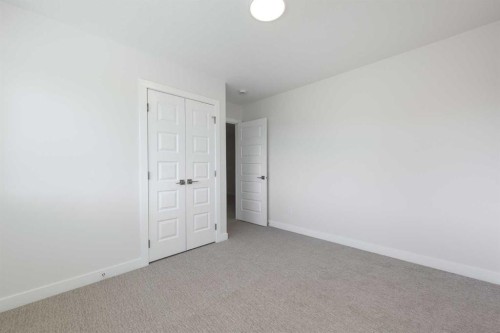 122 Sandpiper Bend, Chestermere, AB - Indoor Photo Showing Other Room