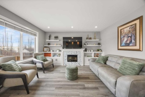 117 Citadel Bluff Close Nw, Calgary, AB - Indoor Photo Showing Living Room With Fireplace
