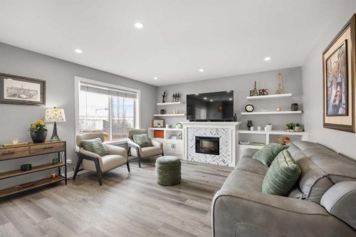 117 Citadel Bluff Close Nw, Calgary, AB - Indoor Photo Showing Living Room With Fireplace