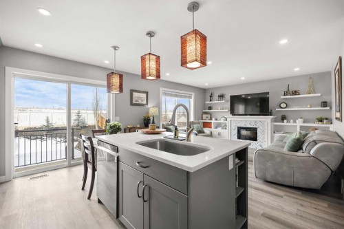 117 Citadel Bluff Close Nw, Calgary, AB - Indoor Photo Showing Other Room With Fireplace