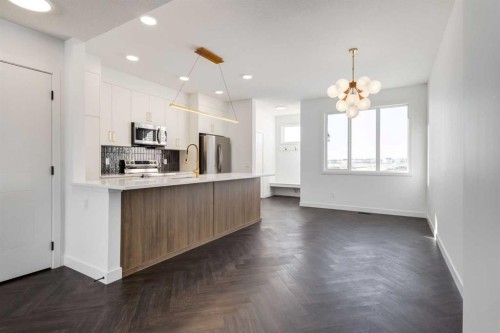 90 Agate Road, Cochrane, AB - Indoor Photo Showing Kitchen