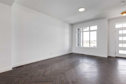 90 Agate Road, Cochrane, AB - Indoor Photo Showing Other Room