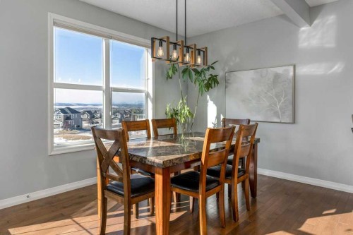128 Sunset Park, Cochrane, AB - Indoor Photo Showing Dining Room
