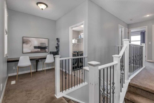 128 Sunset Park, Cochrane, AB - Indoor Photo Showing Other Room