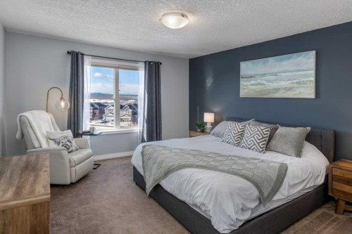 128 Sunset Park, Cochrane, AB - Indoor Photo Showing Bedroom