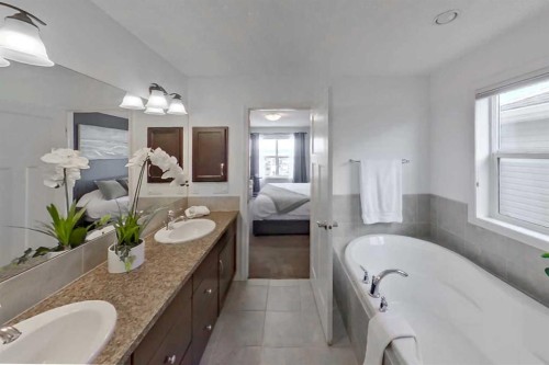 128 Sunset Park, Cochrane, AB - Indoor Photo Showing Bathroom