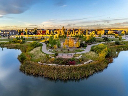 128 Sunset Park, Cochrane, AB - Outdoor With Body Of Water With View