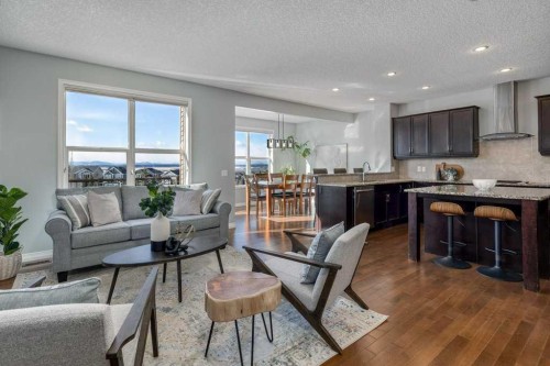 128 Sunset Park, Cochrane, AB - Indoor Photo Showing Living Room