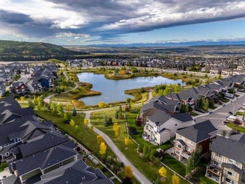 128 Sunset Park, Cochrane, AB - Outdoor With Body Of Water With View