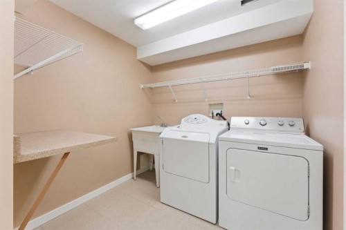 10603 Maplecreek Drive Se, Calgary, AB - Indoor Photo Showing Laundry Room
