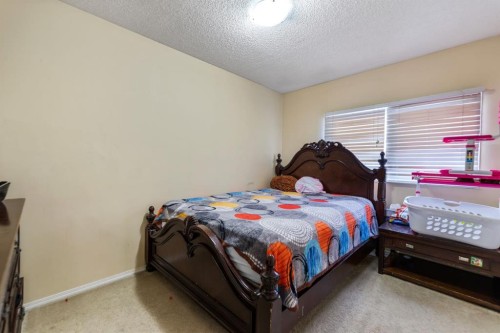 48 Falton Way Ne, Calgary, AB - Indoor Photo Showing Bedroom