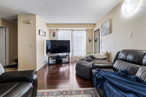 48 Falton Way Ne, Calgary, AB - Indoor Photo Showing Living Room